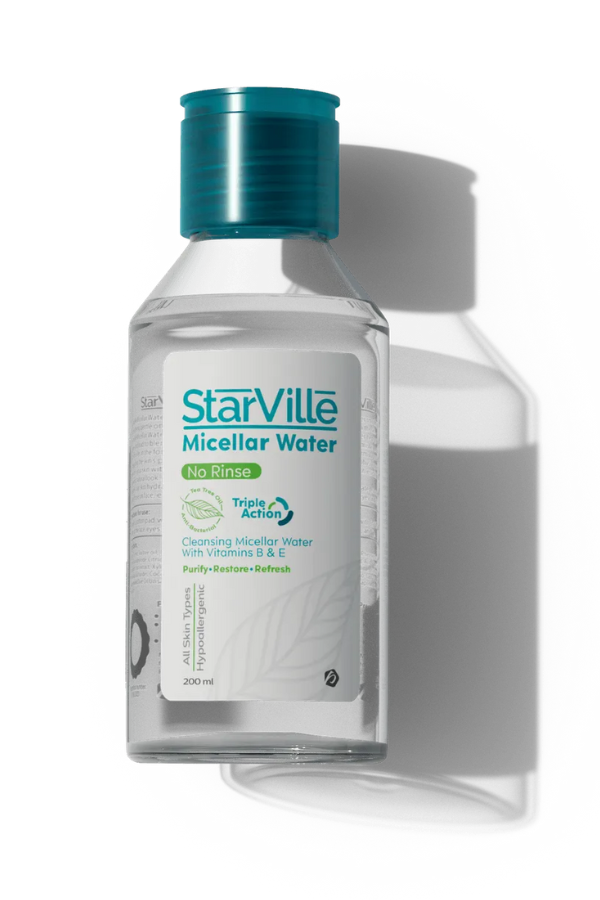 A bottle of Starville Micellar Water 200 ml with a clear liquid visible through the transparent bottle and a green cap.