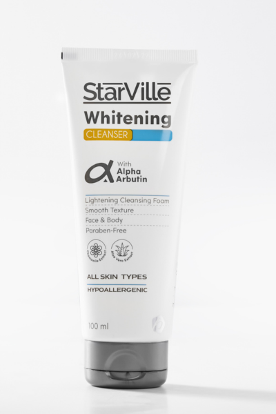 A tube of Starville Whitening Cleanser with the brand name, product name, and benefits listed on the label.