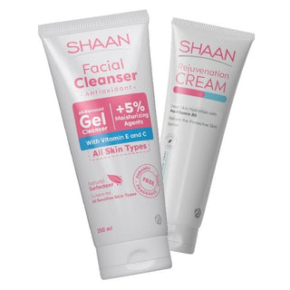 Two tubes of SHAAN brand skin care products, one labeled as 'Facial Cleanser' with antioxidant properties and the other as 'Rejuvenation Cream'. Both are white with blue and pink text and graphics.