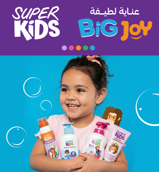 Child holding Big Joy Super Kids products 