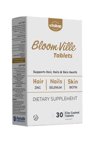 A box of Bloomville Tablets, which is a dietary supplement for hair, nails, and skin health, containing 30 film-coated tablets.