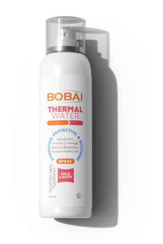 A spray bottle of Bobai Thermal Water, which is marketed as a protective and soothing skin product.