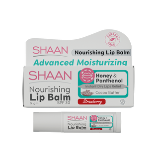 Packaging of Shaan Nourishing Lip Balm in Strawberry flavor with SPF 30, highlighting its moisturizing properties, cocoa butter, coconut oil, and honey & panthenol.
