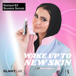Woman holding Glamy Lab retinol B3 booster serum with 'Wake Up to New Skin'