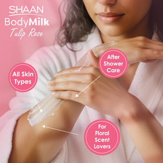 Woman applying Shaan BodyMilk Tulip Rose on her arm with product features highlighted.