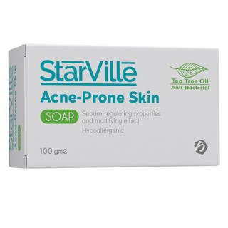 A packaged bar of Starville Acne Prone Skin Soap with Tea Tree Oil, indicating it is for oily and combination skin, with a weight of 100 gm.