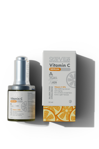 A bottle of Starville Vitamin C Serum placed next to its packaging box, with both items displaying the Starville logo and information about the product.