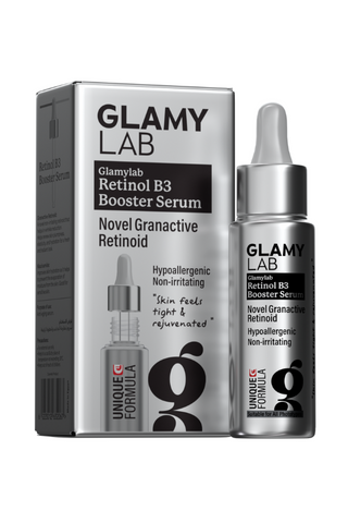 Packaging of GLAMY LAB Retinol Booster Serum with a clear bottle showing the serum inside, placed next to its box which has product details.