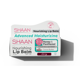 Packaging of Shaan Nourishing Lip Balm with SPF 30, highlighted by its cherry flavor, containing 5 gm of the product. The package emphasizes its moisturizing properties with cocoa butter, honey, and panthenol.