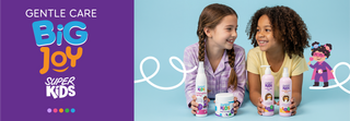 Two children holding Big Joy Super Kids products normal hair, and curly hair