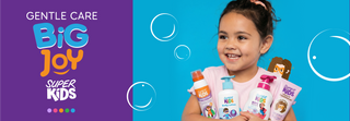 Child holding Big Joy Super Kids products 