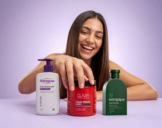 Woman with hair care products including Selengena, Clary, and Seropipe 